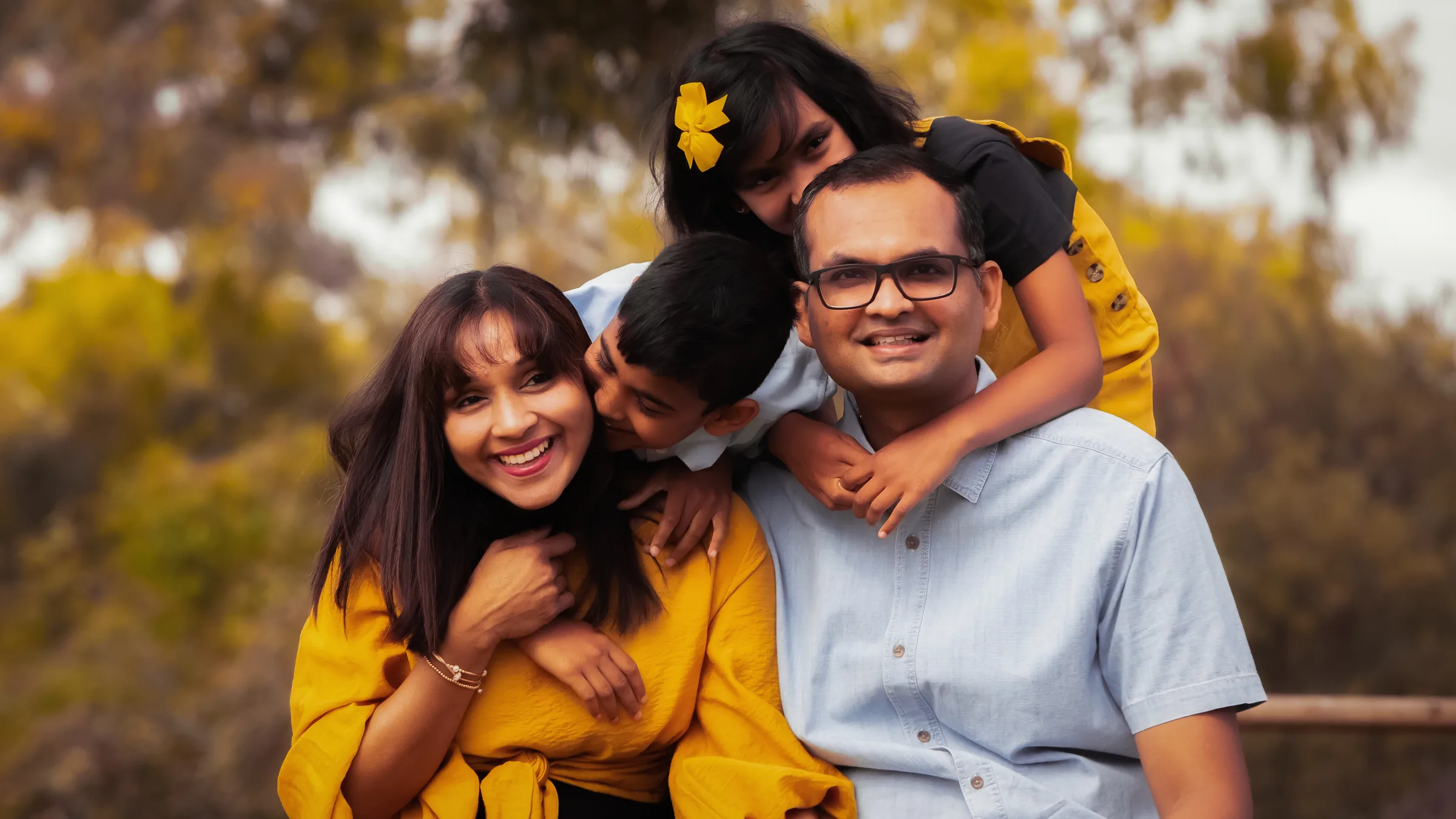 Warm outdoor family portrait photographed in Melbourne by Royale Photography