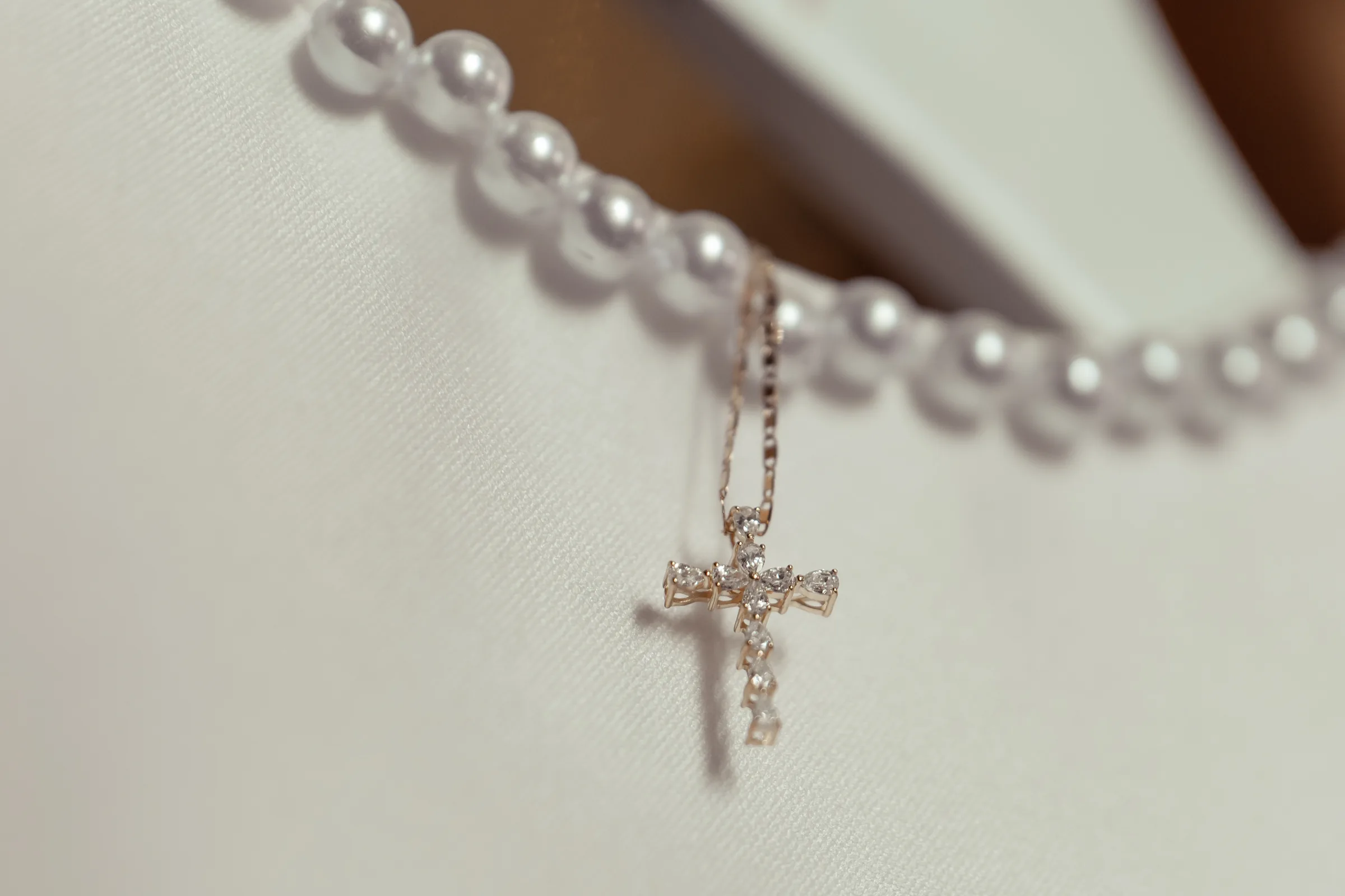 Christening cross and religious detail photographed during a Melbourne baptism celebration