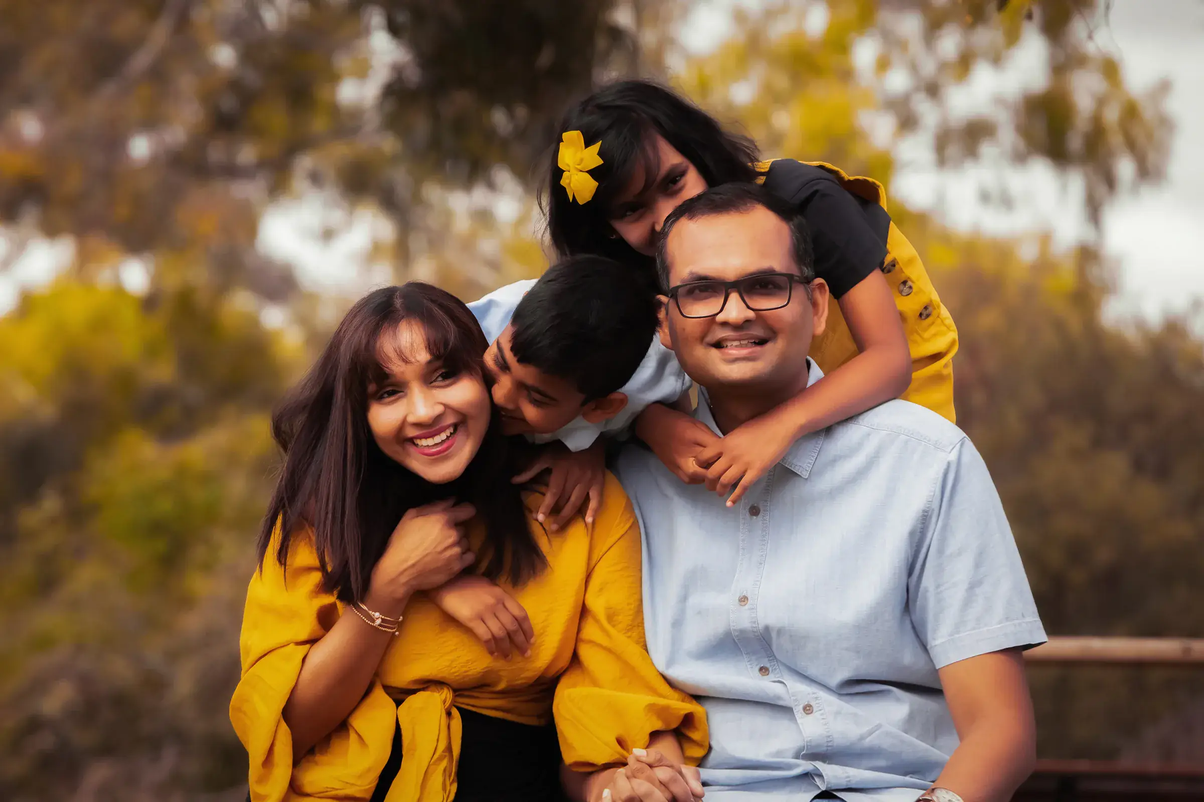Warm outdoor family portrait photographed in Melbourne by Royale Photography