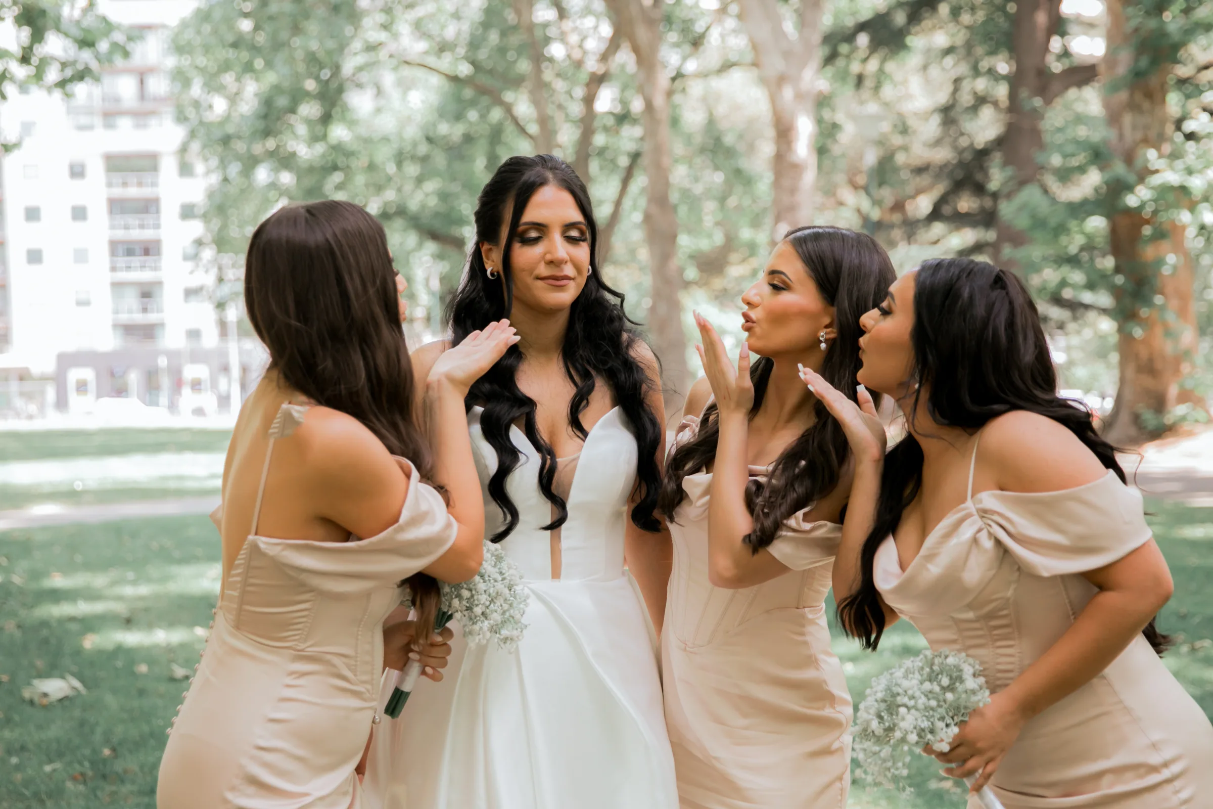 Bridal party laughing together photographed by Royale Photography